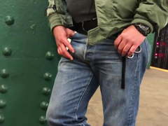 Very masculine worker on the subway